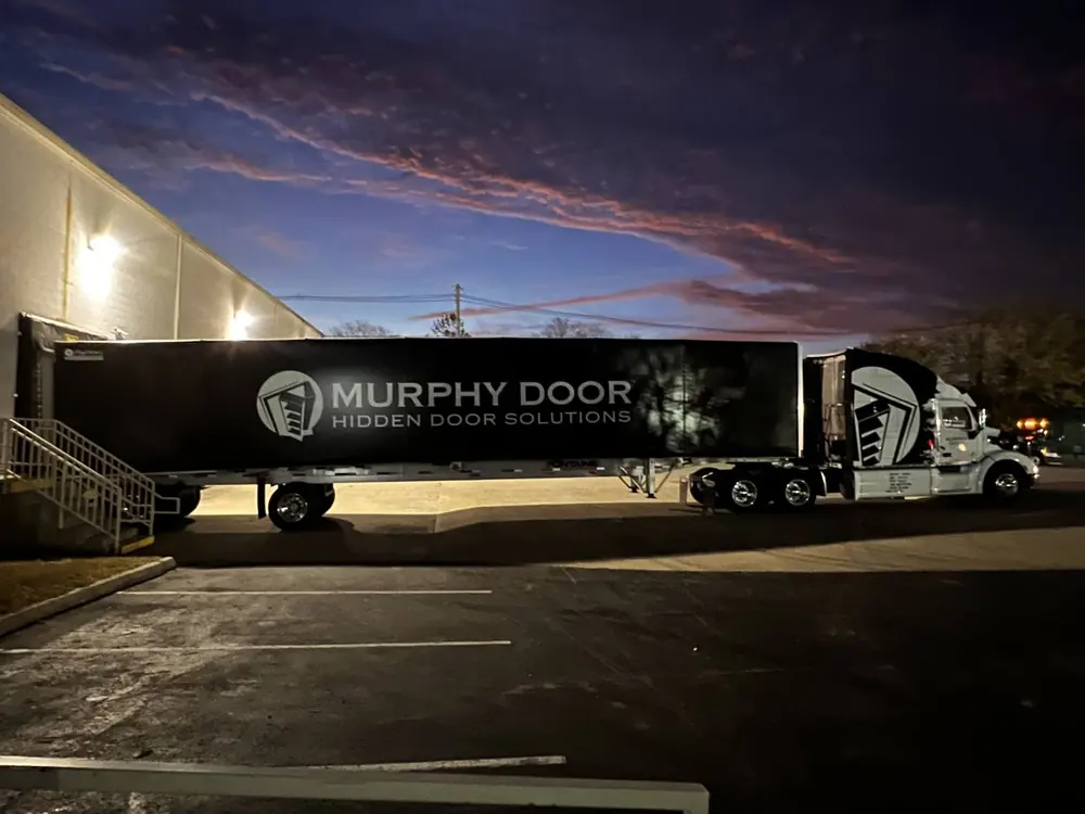 A Murphy Door® delivery truck at a loading dock at dusk. Photo provided by Jeremy Barker.